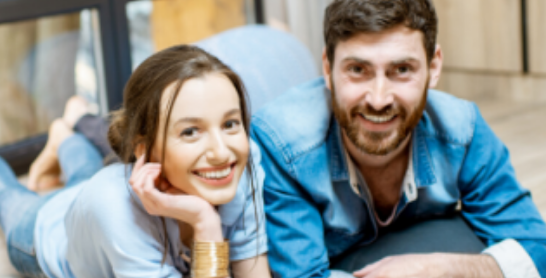happy-man-and-woman-in-front-of-computer